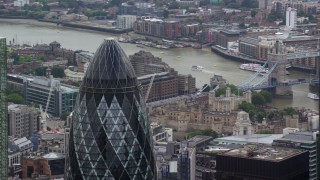 AX114_112 - 5.5K aerial stock footage orbiting the top of The Gherkin skyscraper, Central London, England