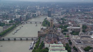 AX114_168E - 5.5K aerial stock footage of Big Ben and Parliament by the River Thames in London England