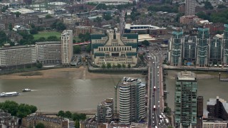 AX114_174 - 5.5K aerial stock footage of MI6 Building, and Vauxhall Bridge over River Thames, London, England