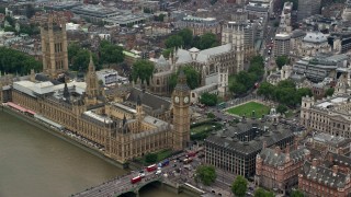 AX114_187 - 5.5K stock footage aerial video of an approach to Big Ben and Parliament in London, England