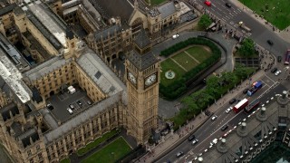 AX114_189 - 5.5K stock footage aerial video of tilting to a bird's eye view of Big Ben, London, England