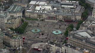 AX114_199 - 5.5K stock footage aerial video of Trafalgar Square in London, England