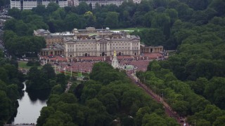 AX114_202E - 5.5K aerial stock footage of orbiting Buckingham Palace and Victoria Memorial in London, England