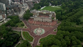 AX114_208 - 5.5K stock footage aerial video approach Victoria Memorial monument and Buckingham Palace, London, England