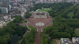 AX114_208E - 5.5K aerial stock footage orbiting the Victoria Memorial monument and Buckingham Palace, London, England