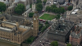 AX114_230 - 5.5K stock footage aerial video of Big Ben, Bridge Street and Portcullis House, London, England