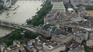 AX114_232 - 5.5K aerial stock footage of Charing Cross Railway Station and Hungerford Bridge, London, England