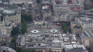 AX114_233 - 5.5K aerial stock footage of Nelson's Column and fountains at Trafalgar Square, London, England