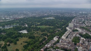 AX114_248 - 5.5K aerial stock footage of Kensington Gardens and Hyde Park with trees, London, England