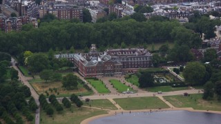 AX114_265E - 5.5K aerial stock footage of the front of Kensington Palace, London, England