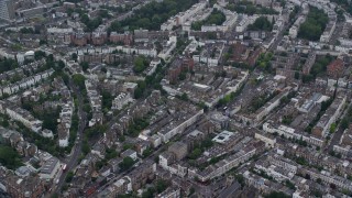 AX114_269E - 5.5K aerial stock footage of an orbit of residential neighborhoods, London, England