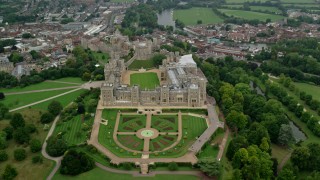 AX114_309 - 5.5K stock footage aerial video of an orbit of Windsor Castle and East Terrace Lawn, England