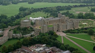 AX114_312 - 5.5K stock footage aerial video flyby Windsor Castle, England