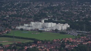 AX115_044E - 5.5K aerial stock footage of St Helier Hospital in Carshalton, England