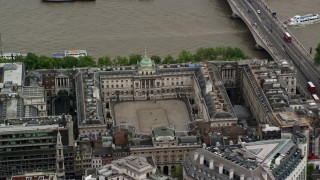 AX115_097 - 5.5K aerial stock footage of an orbit of Somerset House along River Thames, London England