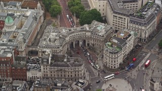 AX115_098E - 5.5K aerial stock footage of approaching The Admiralty Arch at Trafalgar Square, London England