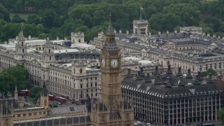 AX115_107 - 5.5K aerial stock footage of orbiting Big Ben and Portcullis House, London England