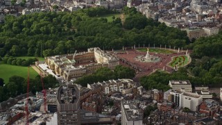 AX115_125E - 5.5K aerial stock footage of orbiting Buckingham Palace and Victoria Memorial, England