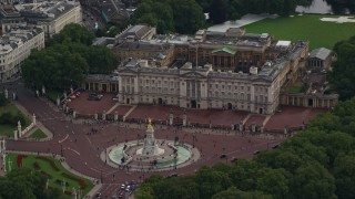 AX115_134E - 5.5K aerial stock footage of an orbit around the Victoria Memorial at Buckingham Palace, London, England