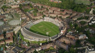 AX115_144 - 5.5K aerial stock footage of orbiting The Oval cricket stadium, London, England