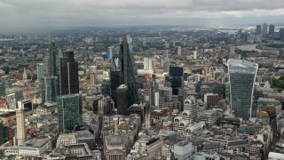 AX115_156 - 5.5K aerial stock footage of orbiting a group of skyscrapers in Central London, England