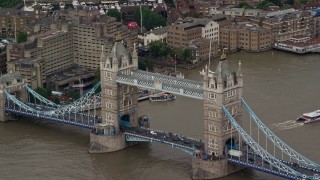 AX115_170 - 5.5K aerial stock footage of the Tower Bridge with traffic, Central London, England