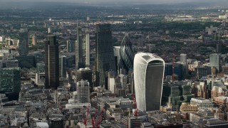 AX115_186 - 5.5K aerial stock footage of approaching Central London skyscrapers from River Thames, England