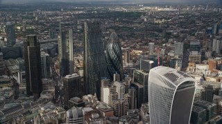 AX115_187E - 5.5K aerial stock footage approach The Gherkin and Leadenhall Building skyscrapers, Central London, England