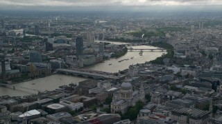 AX115_192 - 5.5K aerial stock footage approach St Paul's Cathedral near the Thames, London, England