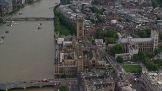 AX115_198 - 5.5K aerial stock footage of Big Ben, Parliament and Westminster Abbey by the Thames, London, England