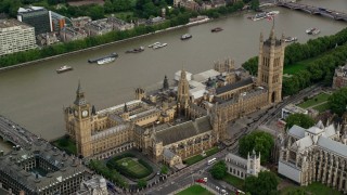 AX115_214 - 5.5K aerial stock footage video approach Big Ben and Parliament, London, England