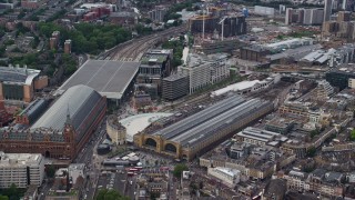 AX115_236E - 5.5K aerial stock footage of Kings Cross Station and office buildings, London, England