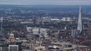 AX115_243 - 5.5K aerial stock footage of Tower Bridge over the Thames, The Shard and cityscape, London, England