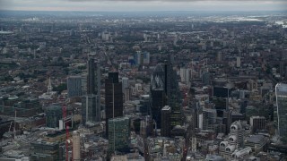 AX116_011 - 5.5K aerial stock footage of Heron Tower, Tower 42, The Gherkin, Leadenhall skyscrapers, London, England, twilight