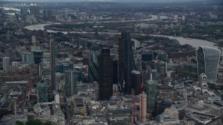 AX116_012 - 5.5K aerial stock footage orbit Central London skyscrapers, reveal 20 Fenchurch Street, London, England, twilight