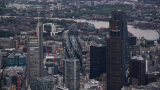 AX116_013 - 5.5K aerial stock footage of orbiting Central London skyscrapers, London, England, twilight