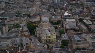 AX116_082 - 5.5K aerial stock footage of approaching St Paul's Cathedral, London, England, twilight