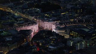 AX116_179E - 5.5K aerial stock footage of the bright lights of Piccadilly Circus, London, England, night