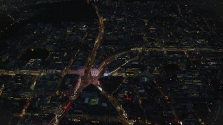 AX116_187 - 5.5K aerial stock footage of an orbit of Piccadilly Circus and city buildings, London, England, night
