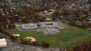 AX117_029 - 5.5K aerial stock footage of a junior high school in Autumn, Merrick, New York