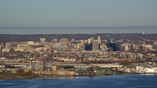 AX118_222 - 5.5K aerial stock footage of waterfront refineries and skyscrapers in Newark, New Jersey