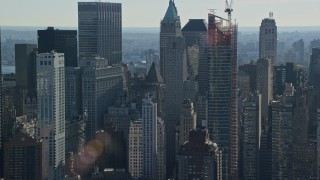 AX119_017E - 5.5K aerial stock footage of downtown skyscrapers in Lower Manhattan, New York City