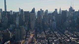 AX119_029 - 5.5K aerial stock footage of skyscrapers in Hell's Kitchen in Midtown, New York City