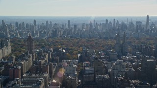 AX119_032E - 5.5K aerial stock footage of high-rises on the Upper West Side in Autumn, New York City