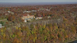 AX119_052E - 5.5K aerial stock footage orbit St Peter's College in Autumn, Englewood Cliffs, New Jersey
