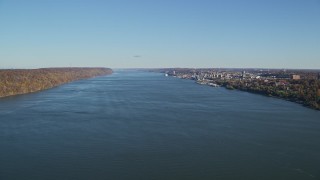 AX119_058E - 5.5K aerial stock footage of Yonkers and the Hudson River in New York in Autumn