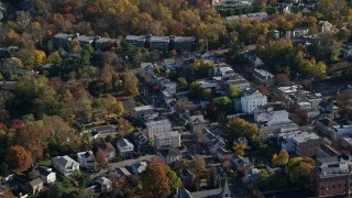 AX119_080E - 5.5K aerial stock footage of small town shops in Dobbs Ferry in Autumn, New York