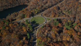 AX119_155 - 5.5K aerial stock footage of a roundabout in Autumn, Highland Falls, New York