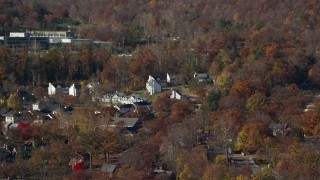 AX119_171 - 5.5K aerial stock footage of housing at West Point Military Academy in Autumn, West Point, New York