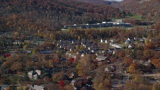 AX119_172 - 5.5K aerial stock footage of housing at West Point Military Academy campus in Autumn, West Point, New York
